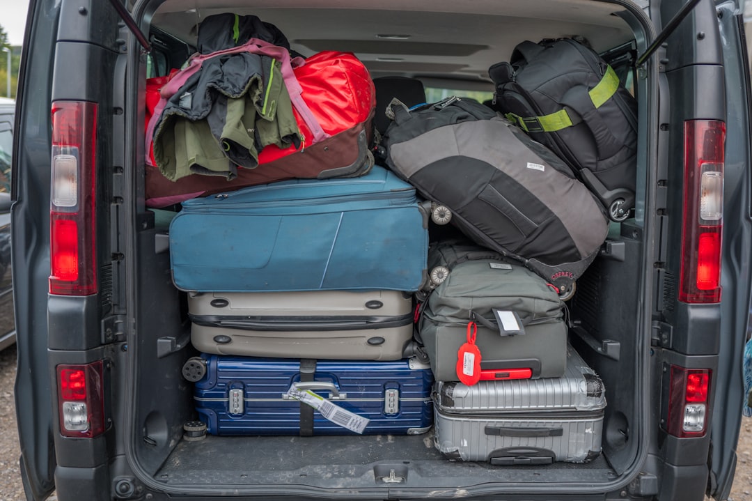 Car packed with luggage and gear ready for a road trip