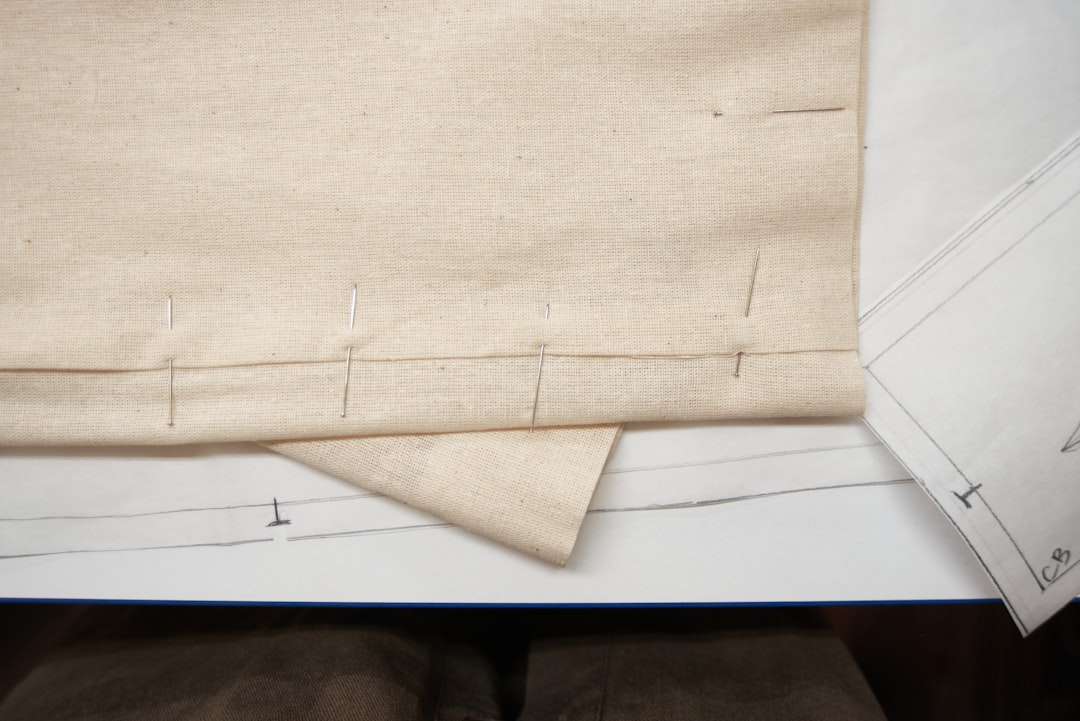 Fabric pinned for hemming to fix garment length