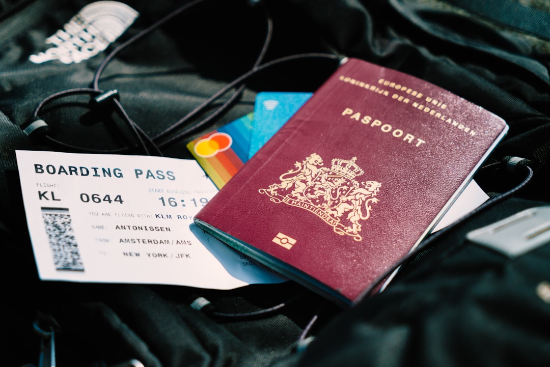 Passport, boarding pass, and credit cards organized together, ready for the airport security line