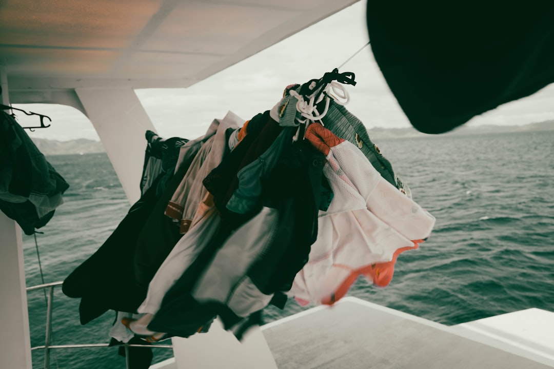 Clothes drying on a line illustrating the travel sink-wash routine