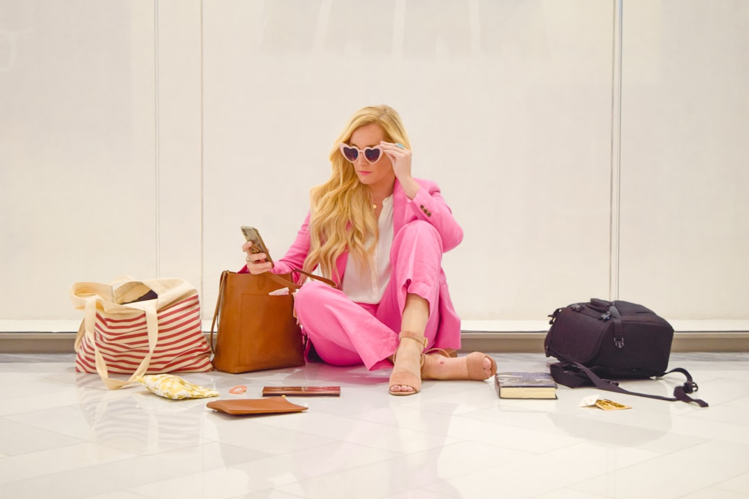A traveler in a comfortable airplane outfit walking through the airport